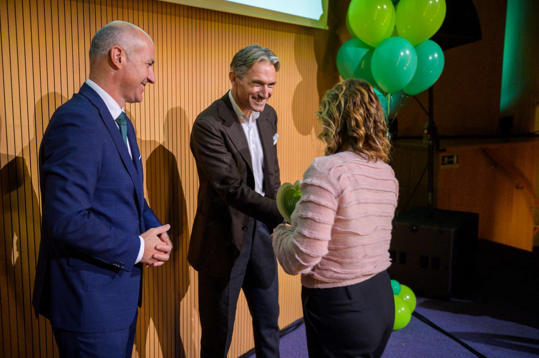 Richard Francis giving a handshake to the winner
