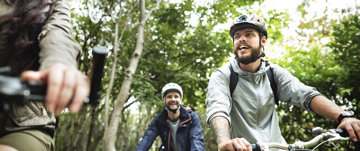A group biking in a forest