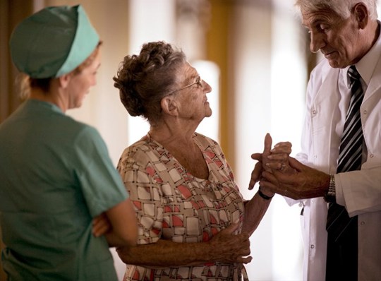 Doctor and nurse with patient