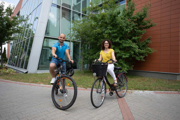 Man and woman on bikes