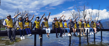 Employees outdoors raising hands China
