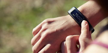A person using their fitness tracker