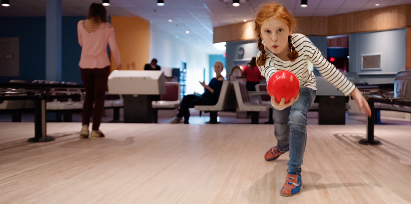 red head girl bowling