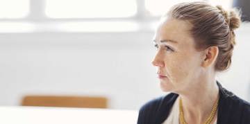 Woman looking sternly to the side
