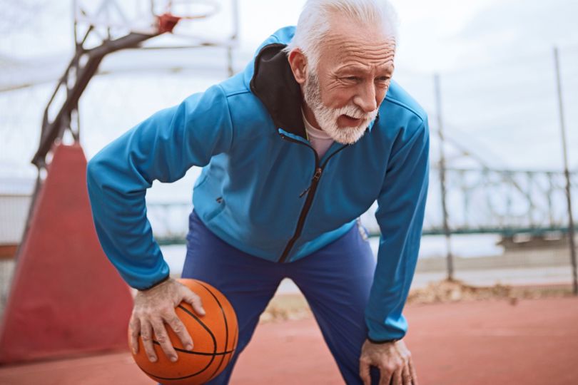 Man holding basketball