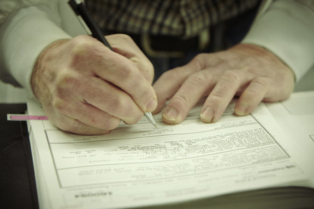 Man writing on paper