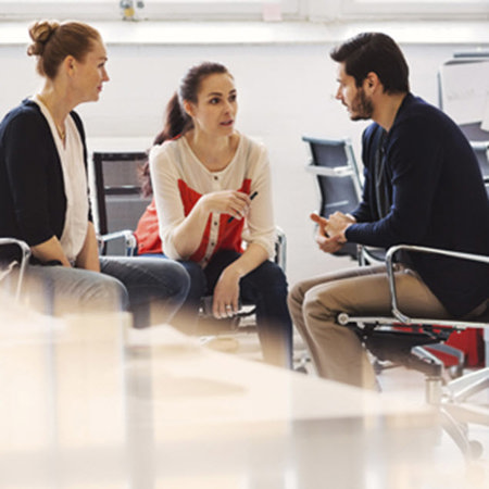 People sitting and talking in an office