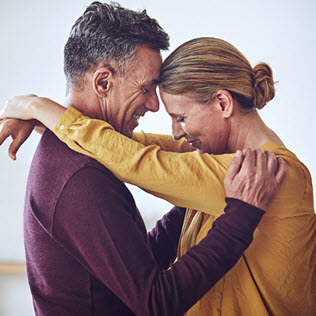 Mature couple hugging