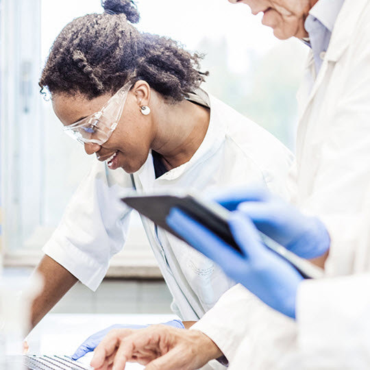 Scientist wearing protective glasses