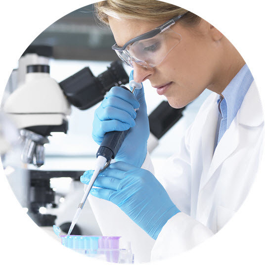 Woman testing in a lab